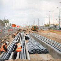 Illustrative: Construction of the new Tel Aviv Light Rail, on Jerusalem Boulevard in Jaffa-Tel Aviv on February 25, 2020. (Miriam Alster/Flash90/File)