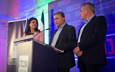 The heads of the Gesher, Labor and Meretz party, Orly Levy, Amir Peretz and Nitzan Horowitz at the party headquarters on elections night, in Tel Aviv on March 2, 2020. (Avshalom Sassoni/ Flash90)