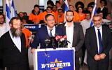 Otzma Yehudit chairman Itamar Ben Gvir (second from L) speaks to the media at the party headquarters on elections night in Jerusalem, on March 2, 2020. (Mendy Hechtman/Flash90)