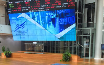 A stock market ticker screen in the lobby of the Tel Aviv Stock Exchange, in the center of Tel Aviv, March 09, 2020. Avshalom Sassoni/Flash90)