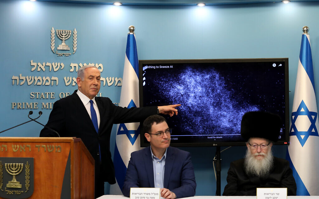 Prime Minister Benjamin Netanyahu, left, with Health Minister Yaakov Litzman, right, and Health Ministry General Manager Moshe Bar Siman-Tov at a press conference about the coronavirus at the Prime Minister's Office in Jerusalem, March 11, 2020. (Flash90) Prime Minister Benjamin Netanyahu, left, with Health Minister Yaakov Litzman, right, and Health Ministry General Manager Moshe Bar Siman-Tov at a press conference about the coronavirus at the Prime Minister's Office in Jerusalem, March 11, 2020. (Flash90)