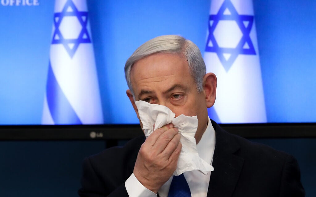 Prime Minister Benjamin Netanyahu tells Israelis to be sure to use tissues when they cough and sneeze, at a press conference about the coronavirus at the Prime Minister's Office in Jerusalem on March 11, 2020. (Flash90) Prime Minister Benjamin Netanyahu tells Israelis to be sure to use tissues when they cough and sneeze, at a press conference about the coronavirus at the Prime Minister's Office in Jerusalem on March 11, 2020. (Flash90)