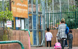 Students arrive to Hadar Elementary School in Kfar Yona, on March 12, 2020. (Chen Leopold/Flash90)