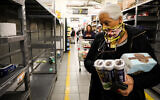 Israelis buy food at a supermarket in Jerusalem on March 14, 2020. (Yossi Zamir/Flash90)