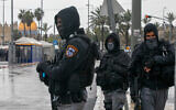 Israeli police officers stand guard outside the Old City on March 20, 2020, in Jerusalem. (Olivier Fitoussi/Flash90)