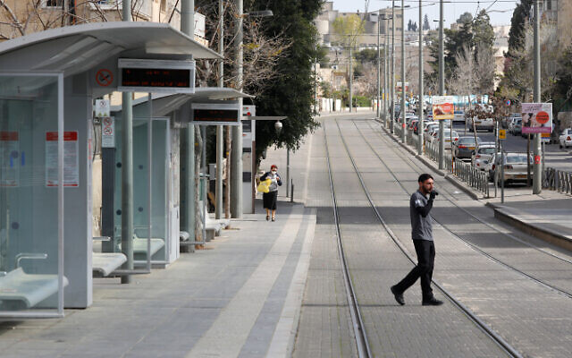 Illustrative: The empty Beit Hakerem neighborhood in Jerusalem on March 25, 2020. (Olivier Fitoussi/Flash90)