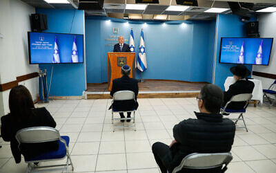 Israeli PM Benjamin Netanyahu speaks during a press conference at the Prime Minister's office in Jerusalem on March 25, 2020. (Olivier Fitoussi/Flash90)