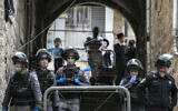Police officers enforce coronavirus restrictions in Mea Shearim, an ultra-Orthodox neighborhood in Jerusalem, on March 30, 2020. (Olivier Fitoussi/ Flash90)
