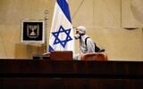 A worker disinfecting the Knesset on March 15, 2020. (Adine Wolman/Knesset Spokesperson's Office)