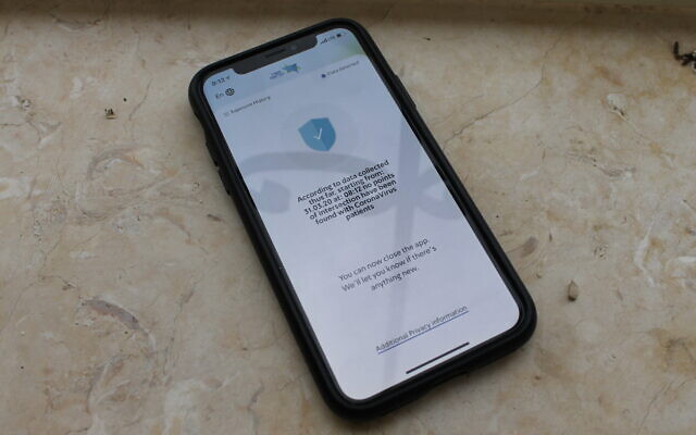 An iPhone running the Health Ministry's HaMagen app, which aims to track the spread of the novel coronavirus and warn users if they have interacted with someone infected. (Sam Sokol) An iPhone running the Health Ministry's HaMagen app, which aims to track the spread of the novel coronavirus and warn users if they have interacted with someone infected. (Sam Sokol)