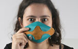 Yael Mordechay models her technology-driven, stylish mask made during a Bezalel Academy class project earlier this year (Courtesy Yael Mordechay)