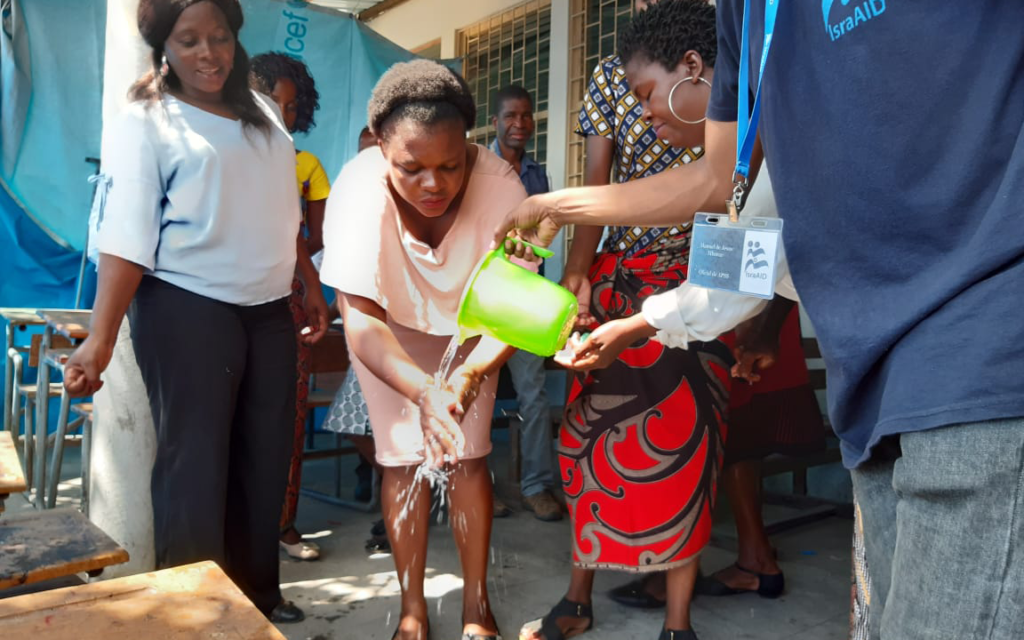 In response COVID-19, IsraAID team brought buckets and soap along to sessions training training teachers and education officials in psychosocial support in Mozambique. Many schools have been without adequate hand washing facilities since the cyclone Idai in 2019. (IsraAID)