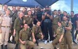 One-time Washington Redskins teammates Adrian Peterson and Josh Norman ran obstacle courses with Israeli soldiers and took Krav Maga lessons while on a visit to Israel. (IDF Twitter via JTA)
