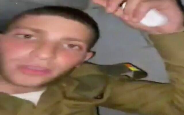 IDF soldier Yishai Halevi is seen in video filmed inside the luggage compartment of a moving bus on March 6, 2020. (Screen capture: Channel 12) IDF soldier Yishai Halevi is seen in video filmed inside the luggage compartment of a moving bus on March 6, 2020. (Screen capture: Channel 12)