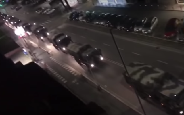 A convoy of Italian military vehicles reportedly being used to transport bodies of coronavirus fatalities for burial, March 19, 2020 (Youtube screenshot) A convoy of Italian military vehicles reportedly being used to transport bodies of coronavirus fatalities for burial, March 19, 2020 (Youtube screenshot)