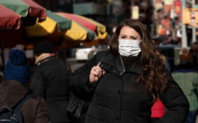 A woman wears a mask amid coronavirus fears in New York, Jan. 30, 2020. (AP/Mark Lennihan)