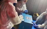 Elections officials record ballots cast by Israelis under coronavirus quarantine, March 3, 2020. (Courtesy/Central Elections Committee)