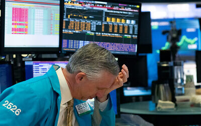 A trader at the New York Stock Exchange, March 18, 2020. (AP/Mark Lennihan)