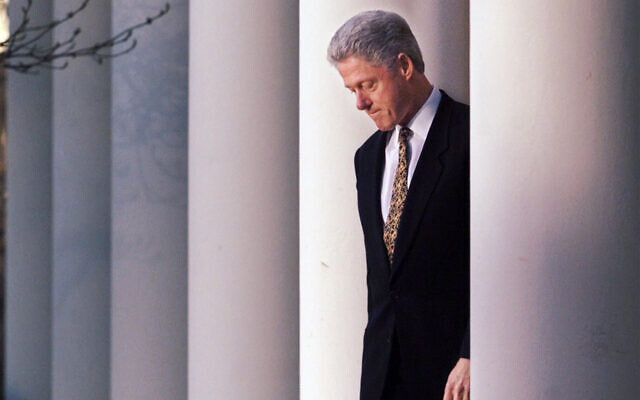 US President Bill Clinton walks to the podium to deliver a short statement on his impeachment at the White House in Washington, Dec. 11, 1998. (AP Photo/J. Scott Applewhite) US President Bill Clinton walks to the podium to deliver a short statement on his impeachment at the White House in Washington, Dec. 11, 1998. (AP Photo/J. Scott Applewhite)