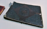 A Nazi photo album bound with human skin identified by researchers at the Auschwitz-Birkenau Memorial and Museum. (Courtesy/Auschwitz-Birkenau Memorial and Museum)