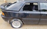 A vehicle vandalized in an apparent hate crime in the northern West Bank Palestinian village of Hawara on March 15, 2020. (Yesh Din)