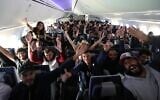 Hundreds of Israeli backpackers aboard an El Al Dreamlimer taking them from Lima, Peru, to Tel Aviv, March 2020 (Sivan Farage)