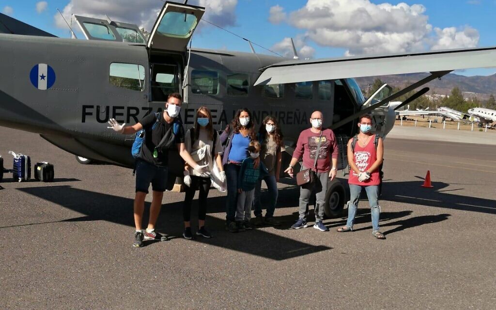 Israeli tourists boarding a Honduran military plane on their way back home, March 26, 2020. (courtesy Honduran Military) Israeli tourists boarding a Honduran military plane on their way back home, March 26, 2020. (courtesy Honduran Military)