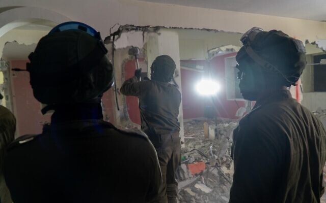 Israeli troops demolish the home of one of the terrorists involved in a bombing attack that killed Rina Shnerb, 17, at a natural spring in the West Bank last year, in the Ramallah area on March 4, 2020. (Israel Defense Forces) Israeli troops demolish the home of one of the terrorists involved in a bombing attack that killed Rina Shnerb, 17, at a natural spring in the West Bank last year, in the Ramallah area on March 4, 2020. (Israel Defense Forces)