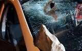 An Israeli vehicle hit by a rock in the West Bank on March 22, 2020 (IDF Spokepserson)