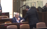 Benny Gantz (L) and Foreign Minister Israel Katz of Likud exchange an elbow bump in lieu of a handshake at the Knesset on March 26, 2020, during the vote on Gantz's election as Knesset speaker (video screenshot)