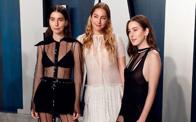 Danielle Haim (L) Este Haim (C) and Alana Haim (R) attend the Vanity Fair Oscar Party at the Wallis Annenberg Center for the Performing Arts on February 09, 2020 in Beverly Hills, California. (Taylor Hill/FilmMagic via JTA)