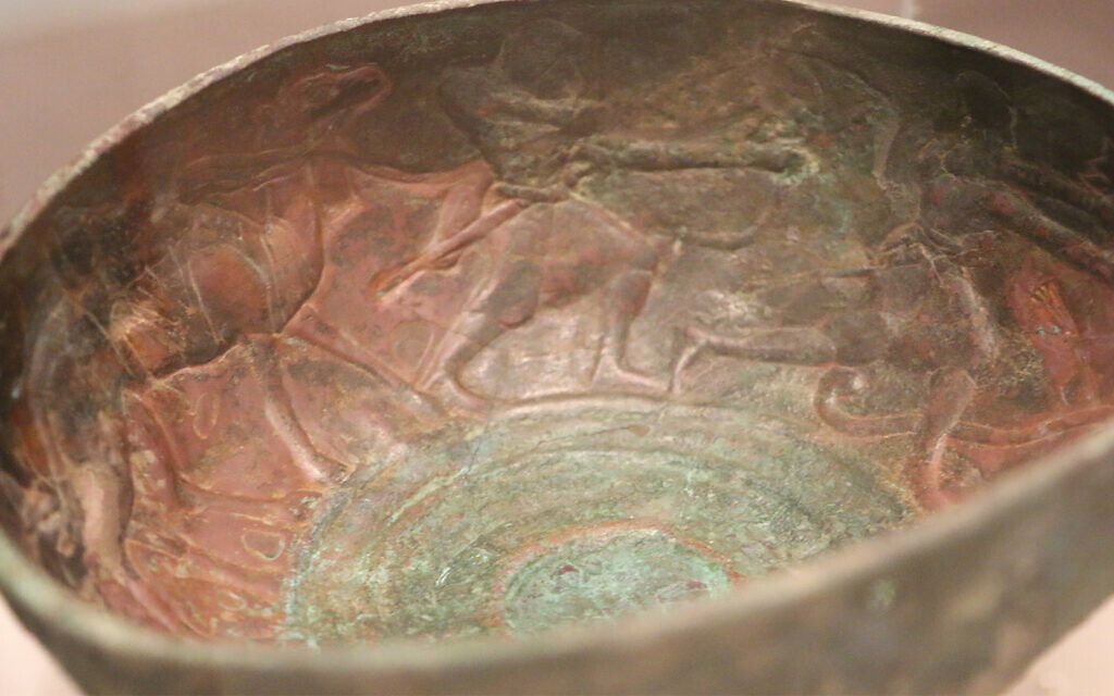 The interior of a bowl from the 1st century CE depicts a lion hunt, an event favored by royals of the time. (Shmuel Bar-Am)