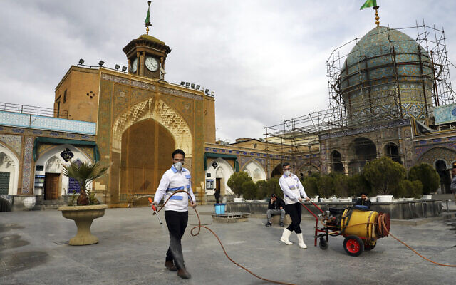 Workers disinfect the shrine of the Shiite Saint Imam Abdulazim to help prevent the spread of the new coronavirus in Shahr-e-Ray, south of Tehran, March, 7, 2020. (AP Photo/Ebrahim Noroozi) Workers disinfect the shrine of the Shiite Saint Imam Abdulazim to help prevent the spread of the new coronavirus in Shahr-e-Ray, south of Tehran, March, 7, 2020. (AP Photo/Ebrahim Noroozi)