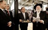 Senior German politician Armin Laschet, center, the minister-president of the state of North Rhine-Westphalia, attends the opening of his state's new cultural and business office in Tel Aviv, March 1, 2020. (Ralph Sondermann/ NRW)
