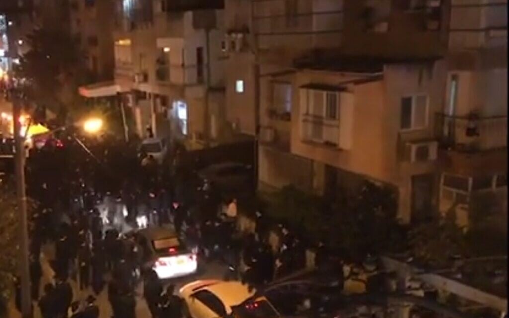 Mourners at a funeral in Bnai Brak, March 28, 2020 (Twitter) Mourners at a funeral in Bnai Brak, March 28, 2020 (Twitter)