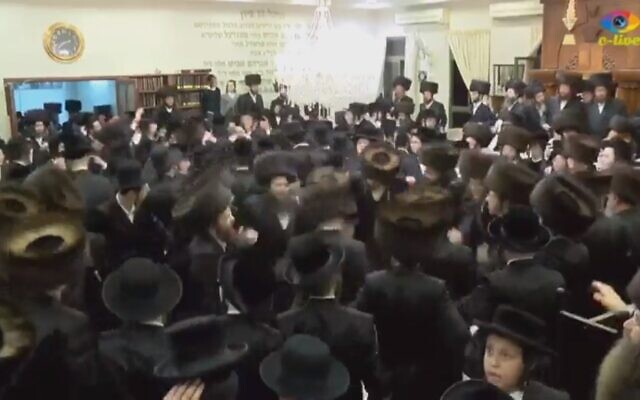 Illustrative: Ultra-Orthodox Israelis dance at a wedding in Beit Shemesh on March 18, 2020 (screenshot: Channel 12) Illustrative: Ultra-Orthodox Israelis dance at a wedding in Beit Shemesh on March 18, 2020 (screenshot: Channel 12)
