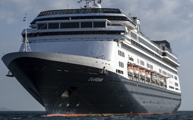 View of Holland America's cruise ship Zaandam as it entered the Panama City bay to be assisted by the Rotterdam cruise ship with supplies, personnel and COVID-19 testing devices, eight miles off the coast of Panama City, on March 27, 2020. (Photo by Ivan PISARENKO / AFP) View of Holland America's cruise ship Zaandam as it entered the Panama City bay to be assisted by the Rotterdam cruise ship with supplies, personnel and COVID-19 testing devices, eight miles off the coast of Panama City, on March 27, 2020. (Photo by Ivan PISARENKO / AFP)