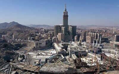 An aerial view shows the Great Mosque and the Mecca Tower and the deserted surroundings in the Saudi holy city of Mecca on April 8, 2020, during the novel coronavirus pandemic crisis. (BANDAR ALDANDANI / AFP)