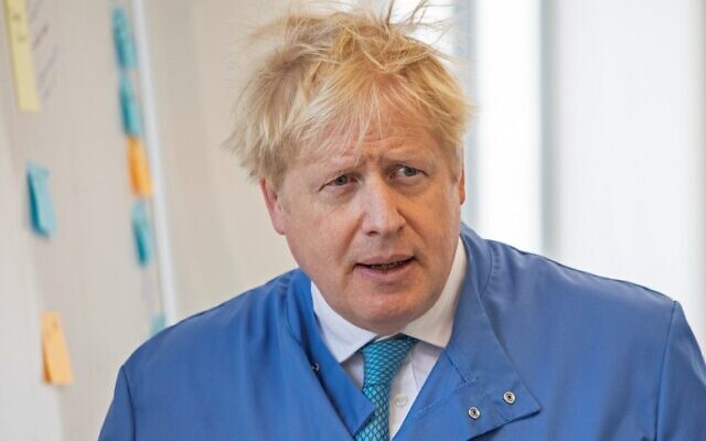 In this file photo taken on March 6, 2020 Britain's Prime Minister Boris Johnson visits the Mologic Laboratory in the Bedford technology Park, north of London. (Jack Hill / POOL / AFP) In this file photo taken on March 6, 2020 Britain's Prime Minister Boris Johnson visits the Mologic Laboratory in the Bedford technology Park, north of London. (Jack Hill / POOL / AFP)