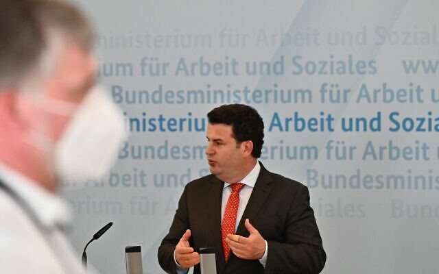 German Labor Minister Hubertus Heil gives a press conference on April 16, 2020 in Berlin, amid the novel coronavirus pandemic. (Photo by Tobias SCHWARZ / AFP)
