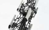 A 5G mast erected by telecom operator 'Proximus' that was set on fire, in Peltheide, Limburg province, Belgium, April 19, 2020.  (YORICK JANSENS / Belga / AFP)