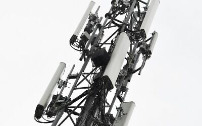 A 5G mast erected by telecom operator 'Proximus' that was set on fire, in Peltheide, Limburg province, Belgium, April 19, 2020.  (YORICK JANSENS / Belga / AFP)