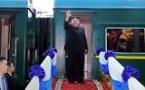 This file photo taken on March 2, 2019 shows North Korea's leader Kim Jong Un waving before boarding his train at the Dong Dang railway station in the Vietnamese town of Lang Son. (Photo by STR / Vietnam News Agency / AFP)