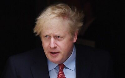 Britain's Prime Minister Boris Johnson walks out of 10 Downing Street to give a statement in central London on April 27, 2020, after returning to work following more than three weeks off after being hospitalized with the COVID-19 illness. (Photo by DANIEL LEAL-OLIVAS / AFP) Britain's Prime Minister Boris Johnson walks out of 10 Downing Street to give a statement in central London on April 27, 2020, after returning to work following more than three weeks off after being hospitalized with the COVID-19 illness. (Photo by DANIEL LEAL-OLIVAS / AFP)