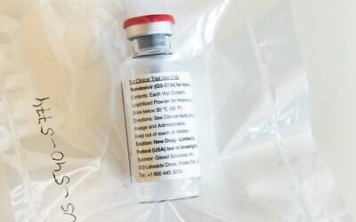 A vial of Gilead Sciences' remdesivir drug is seen during a press conference about the start of a study with drug in particularly ill coronavirus patients at the University Hospital Eppendorf (UKE) in Hamburg, northern Germany on April 8, 2020. (Ulrich Perrey/Pool/AFP)