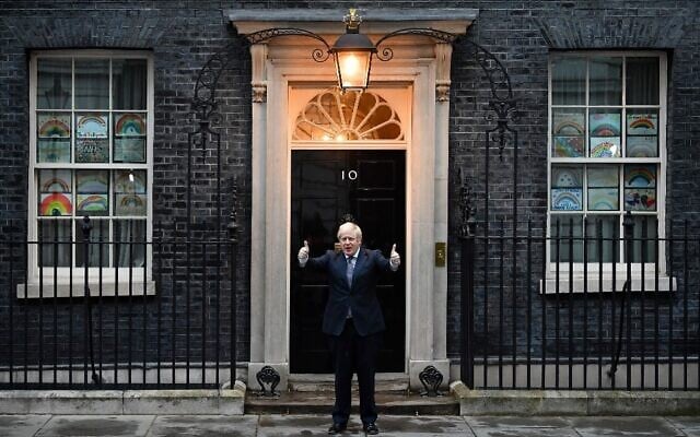 Britain's Prime Minister Boris Johnson after participating in a national 'clap for carers' to show thanks for the work of Britain's National Health Service workers as they battle with the novel coronavirus pandemic, April 30, 2020. (Ben STANSALL/AFP) Britain's Prime Minister Boris Johnson after participating in a national 'clap for carers' to show thanks for the work of Britain's National Health Service workers as they battle with the novel coronavirus pandemic, April 30, 2020. (Ben STANSALL/AFP)