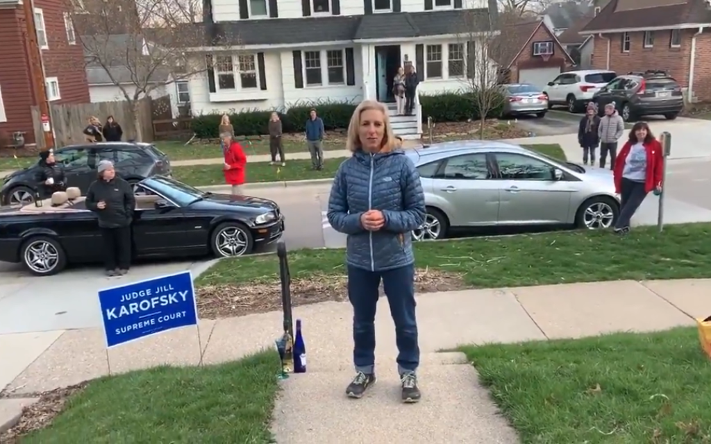Jill Karofsky celebrates her election to Wisconsin's Supreme Court at a social distance outside her Madison home, April 13, 2020. (Screenshot/ via JTA) Jill Karofsky celebrates her election to Wisconsin's Supreme Court at a social distance outside her Madison home, April 13, 2020. (Screenshot/ via JTA)