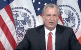 New York City Mayor Bill de Blasio addresses questions about the Police Department’s coordination with organizers of a large funeral in Brooklyn, April 29, 2020. (Screenshot from YouTube)