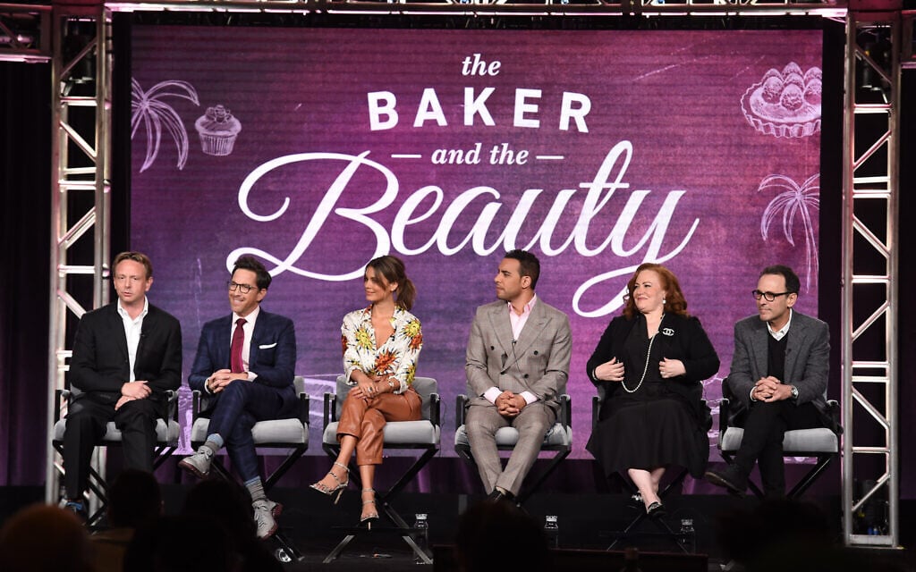 The cast and producers of ABC's 'The Baker and the Beauty,' from left: executive producer Dean Georgaris, Dan Bucatinsky, Nathalie Kelley, Victor Rasuk, executive producer Rachel Kaplan, and executive producer Peter Traugott, address the press on January 8, 2020, at The Langham Huntington Hotel in Pasadena, California. (ABC/Frank Micelotta)