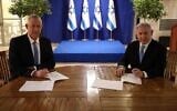 MK Benny Gantz, head of Blue and White (left) and Prime Minister Benjamin Netanyahu, head of Likud, sign their unity government agreement on April 20, 2020. (GPO)